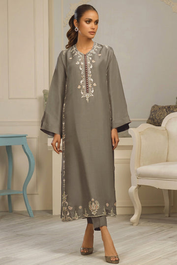 A woman modeling a gray three-piece ethnic wear set, featuring an embroidered Dhanak kurta, shirt, and trouser, presented on a white background with brand text 'SAPPHIRE UNSTICHED WINTER' and product details.