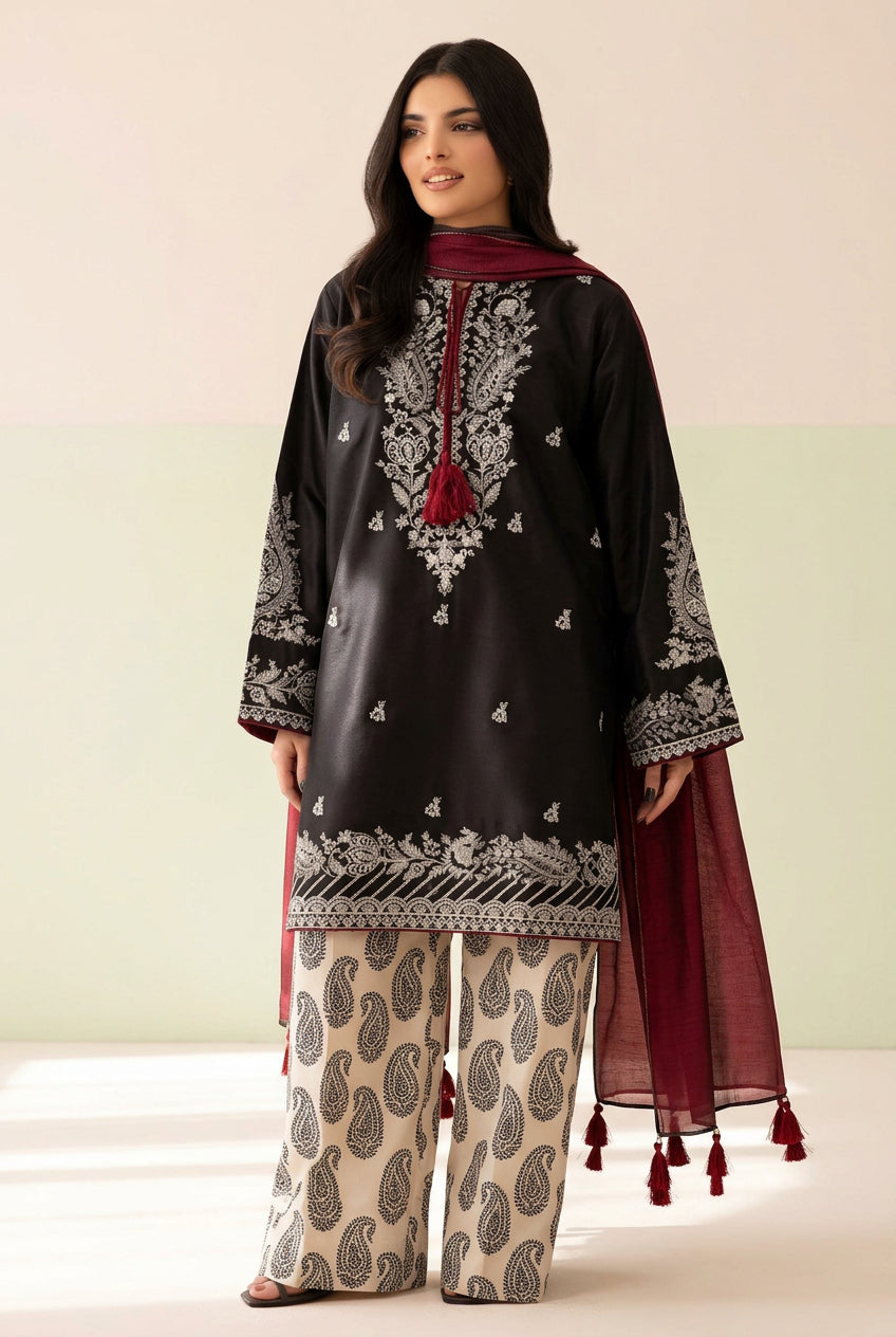 A 3-piece women's ethnic wear set from Mera Iora, featuring a black Dhanak embroidered kurta with a red shawl, beige wide-leg trousers with embroidered motifs, and a matching embroidered trouser. The image is a composite showing a model wearing the outfit on the left and right, with product details and a barcode in the center.