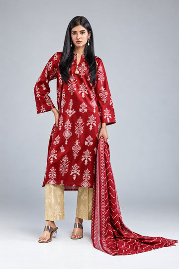 A model wearing a Khaadi 3-piece suit in lawn, featuring a red printed kurta, beige pants, and a matching red dupatta, set against a light beige studio background with product details on the left.