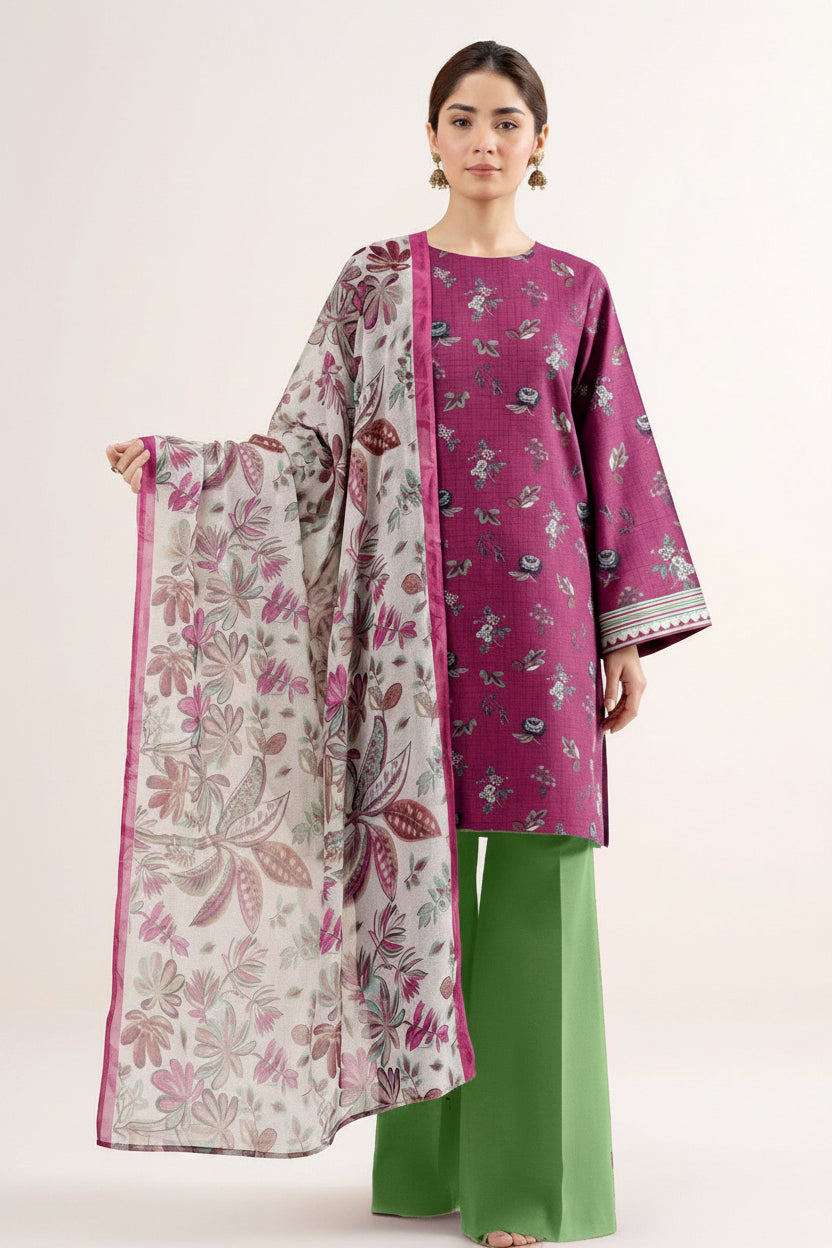 A fashion catalog page for a 3-piece printed lawn suit from Design Stock, featuring a model wearing a purple kurta with floral embroidery, green wide-leg trousers, and a matching floral dupatta. The right side contains product details, a barcode, and the brand name SAPPHIRE.