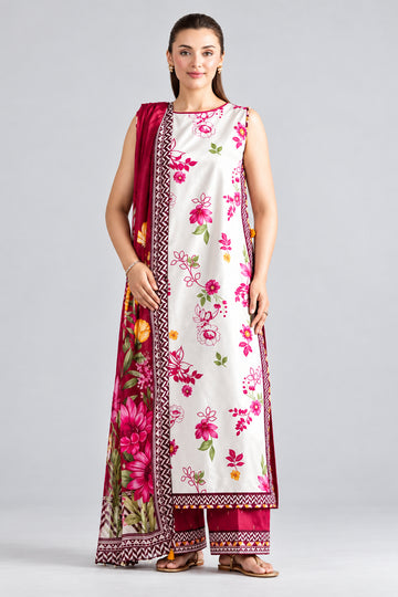 A model wearing a three-piece printed khaadiar suit by Nishat Unstitched, featuring a white kurta with pink and green floral prints, a pink and green dupatta, and a white trouser with a pink border, set against a white background with product details.