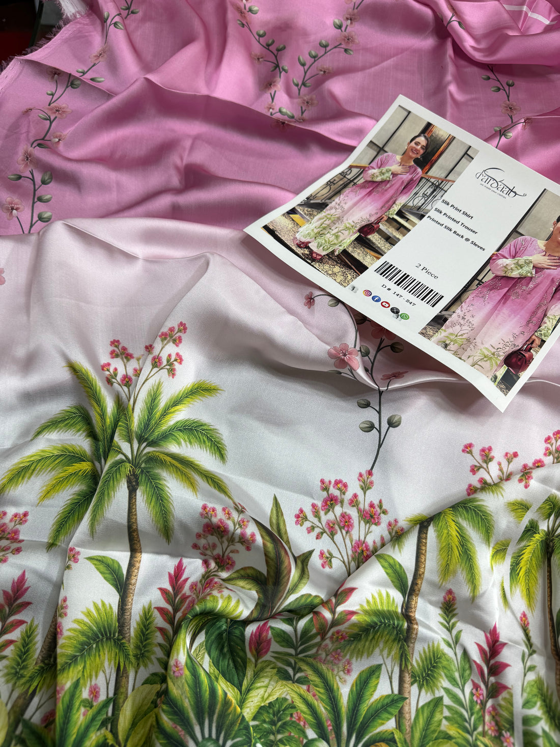 A woman modeling a pink and white printed silk kurta set with floral patterns, shown in a split-screen format with text details in the center.