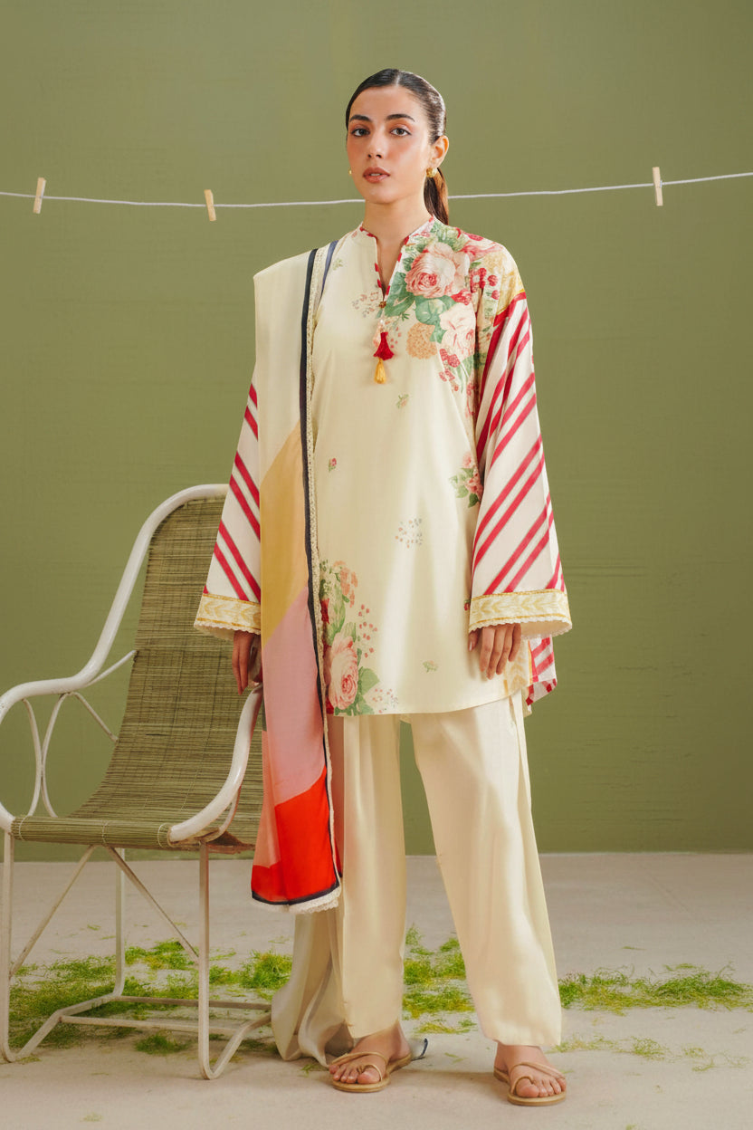 A fashion catalog page for COCO by Zeya Shahidman Prints, featuring a model wearing a printed traditional outfit on the left, with product details and care instructions on the right.