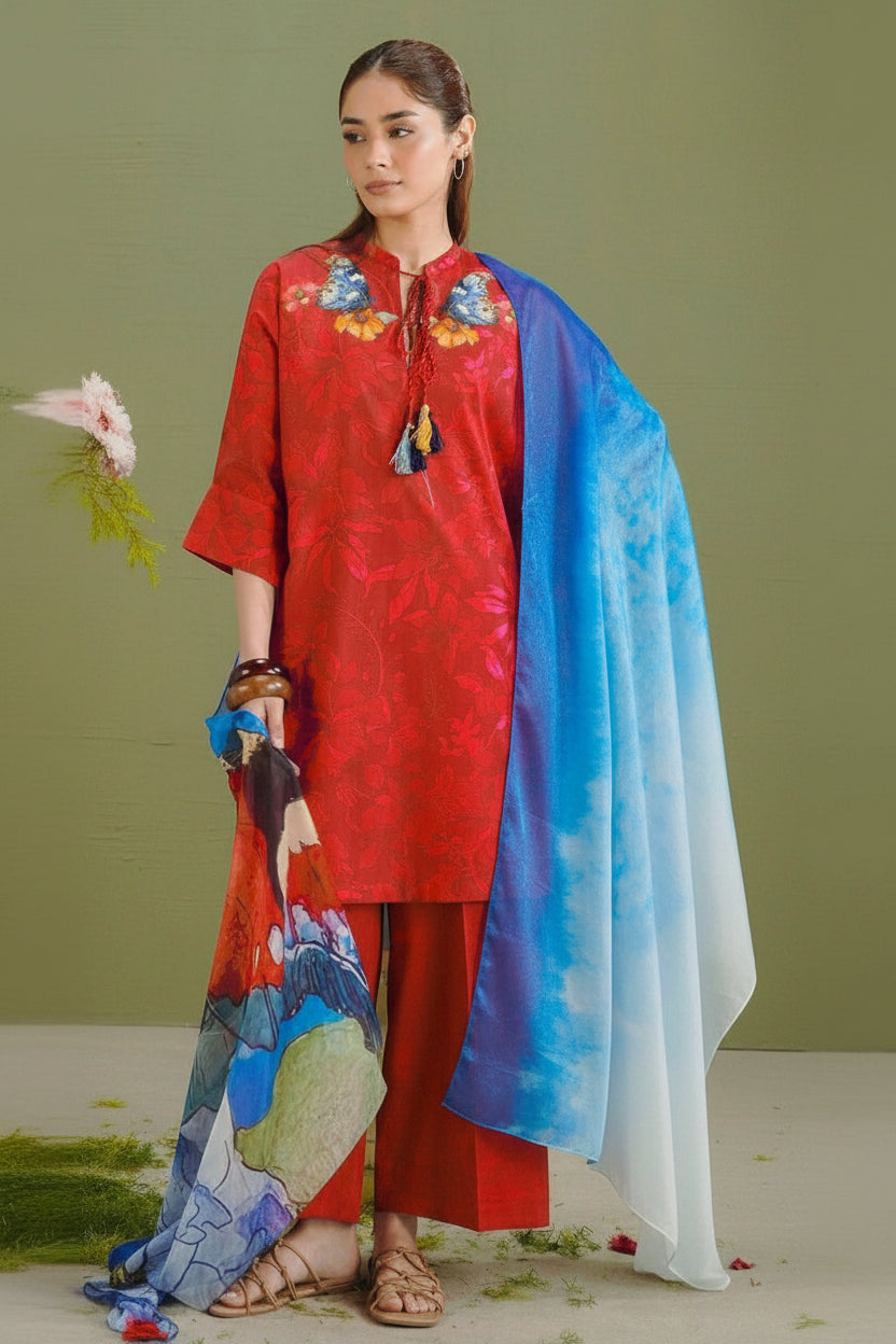 A model wears a printed dupatta and matching printed lawn shirt and trouser set from Coco by Zara Shahjahan, shown on a split informational layout with product text, package details, care instructions, and a QR code.